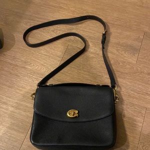 COACH Cassie black top handle bag, with a removable strap